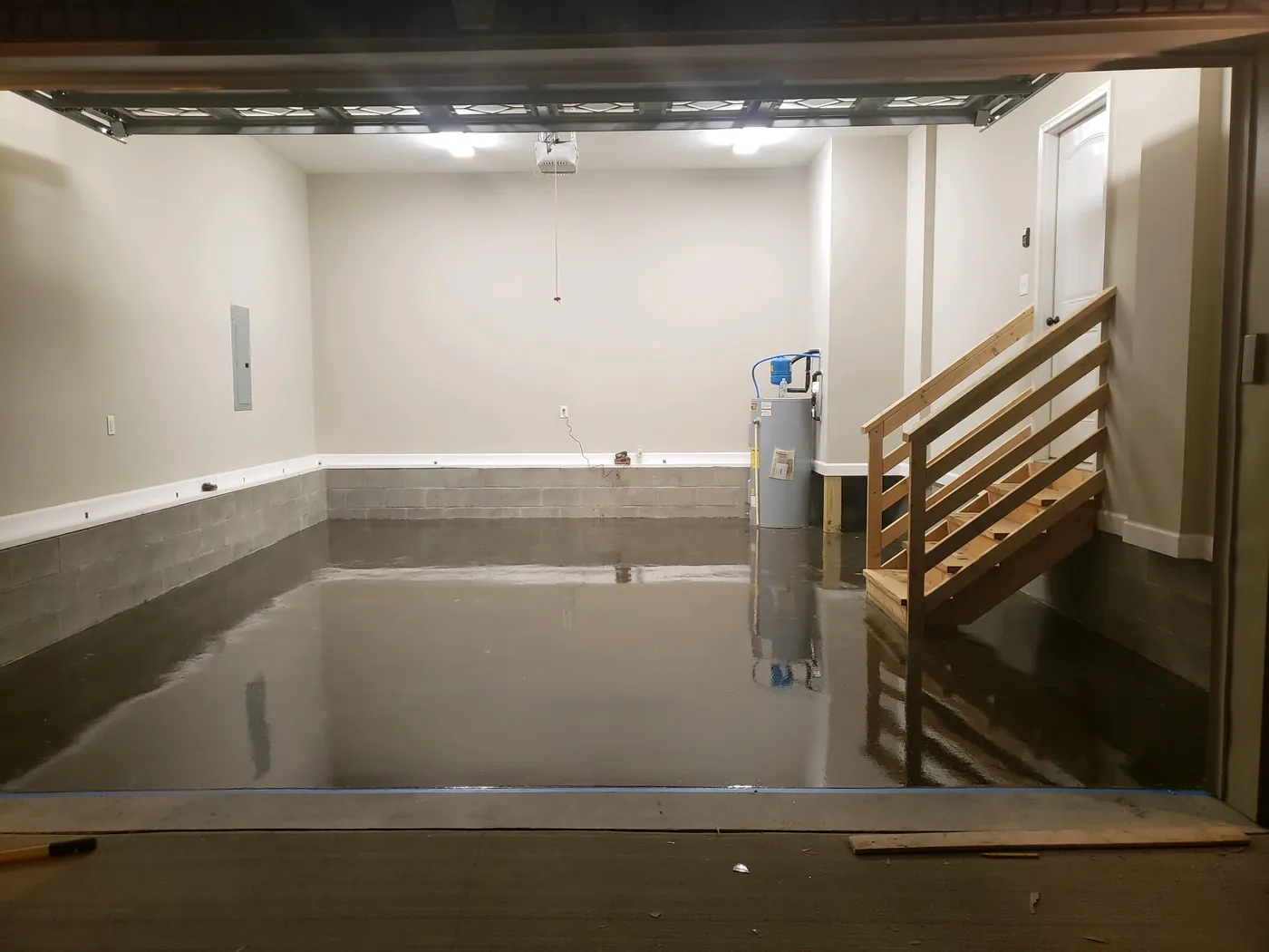 Coated basement floor with stairs
