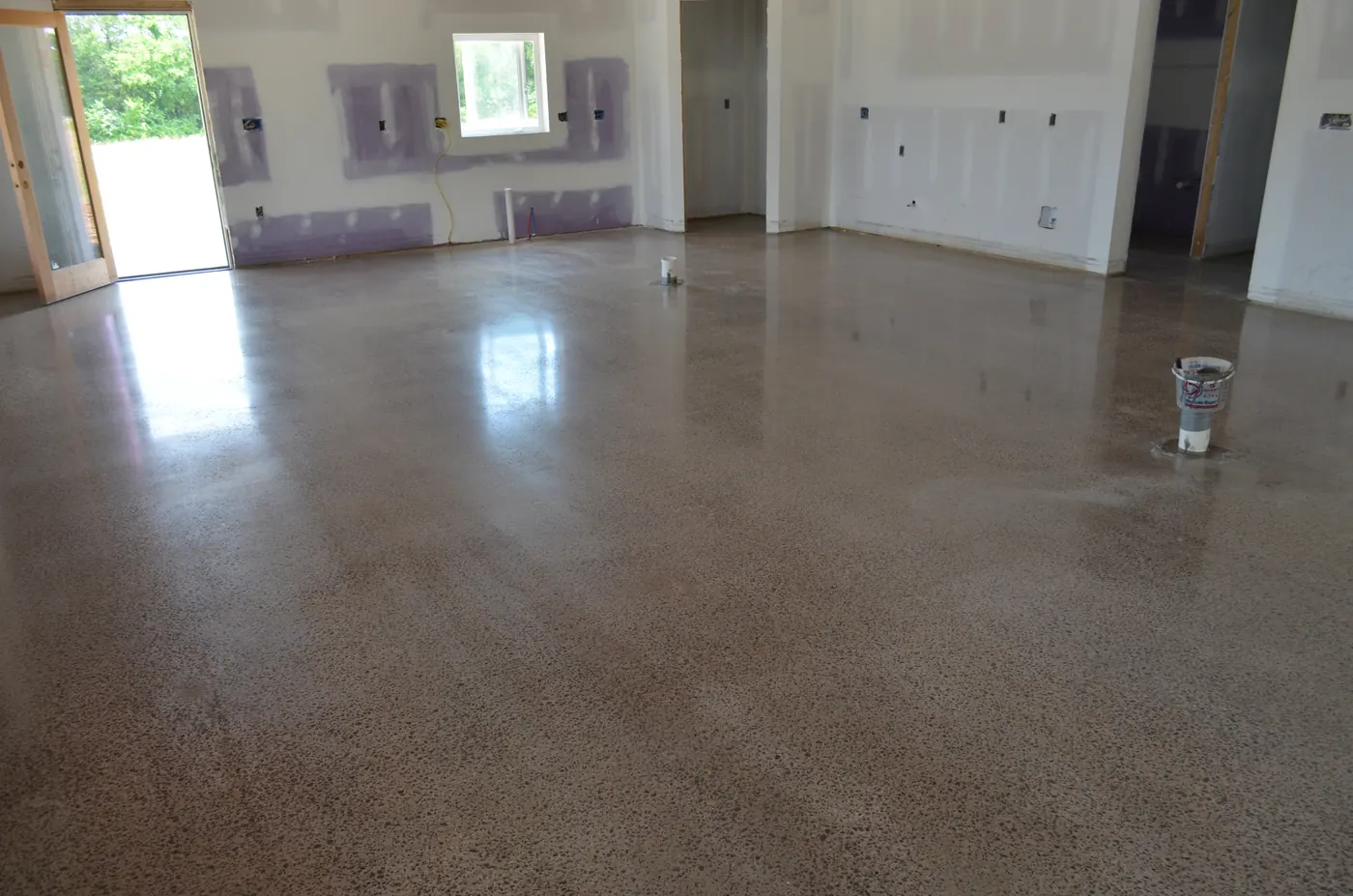 Dark polished concrete with window light