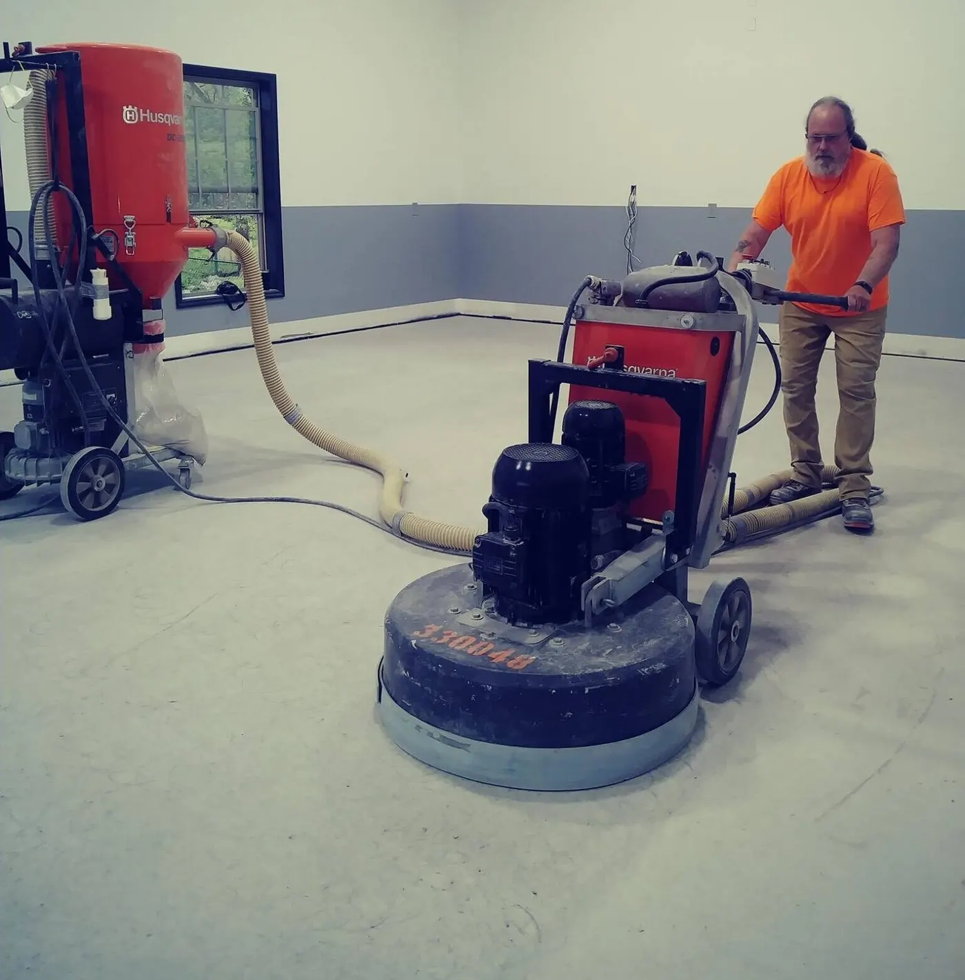 Running the diamond grinder on a commercial floor